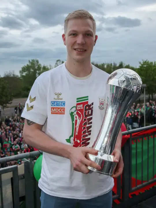 Danish handball player Magnus Saugstrup (SC Magdeburg) with trophy at the reception of the current DHB Cup winner 2024 SC Magdeburg on 15.04.2024 at the GETEC Arena Magdeburg