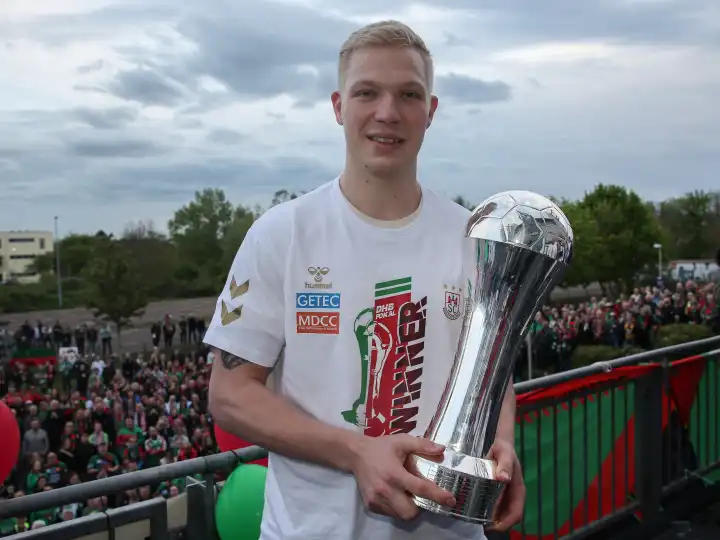 Danish handball player Magnus Saugstrup (SC Magdeburg) with trophy at the reception of the current DHB Cup winner 2024 SC Magdeburg on 15.04.2024 at the GETEC Arena Magdeburg