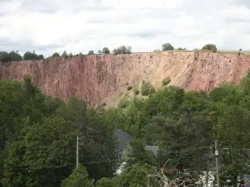 View of the pinge (collapse funnel on the earth's surface above the ore deposit) in Altenberg in summer 2024