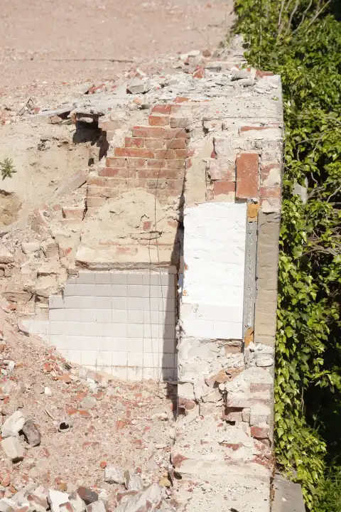 House demolition, wall remains and debris of demolished house, Germany