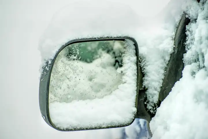 Snowhat On A Car Mirror