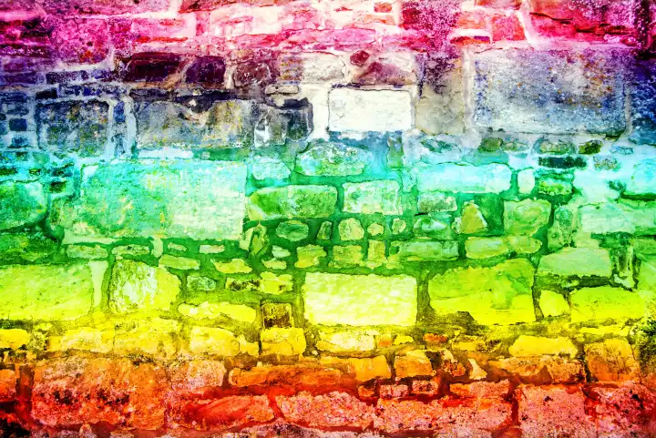 old, medieval abbey wall in LGBTQ colors