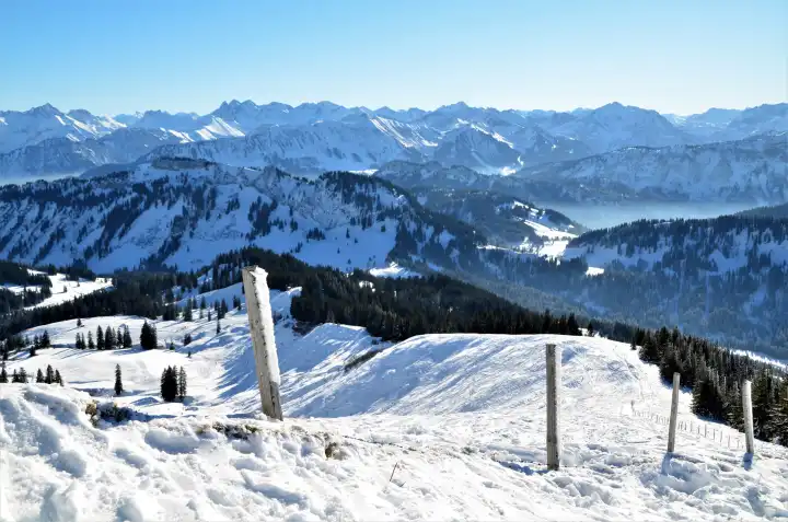 Snowshoe hike in winter in the alps, Bavaria, Germany