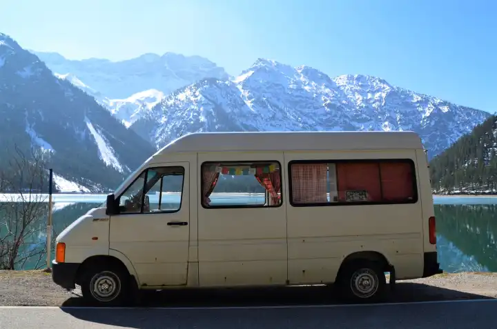 VW-Bus on a travel to Plansee in Reutte/Tirol