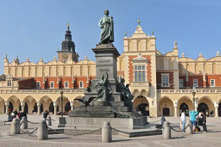 Poland, Cracow, Main Market Square, Sukiennice (Cloth Hall) and Adam Mickiewicz Monument
