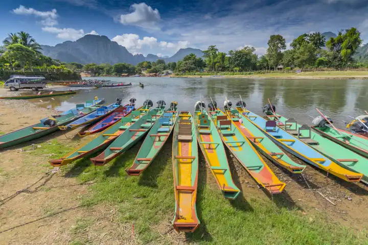 Long tail boats on Song river in Vang Vieng, Laos
