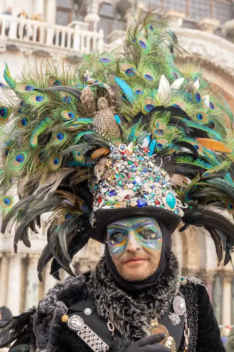 Traditional elaborate mask and costume at the annual Venice carnival. Italy, February 20, 2023.