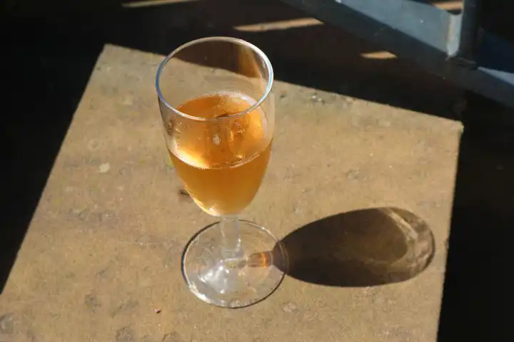 Champagne glass in the sun