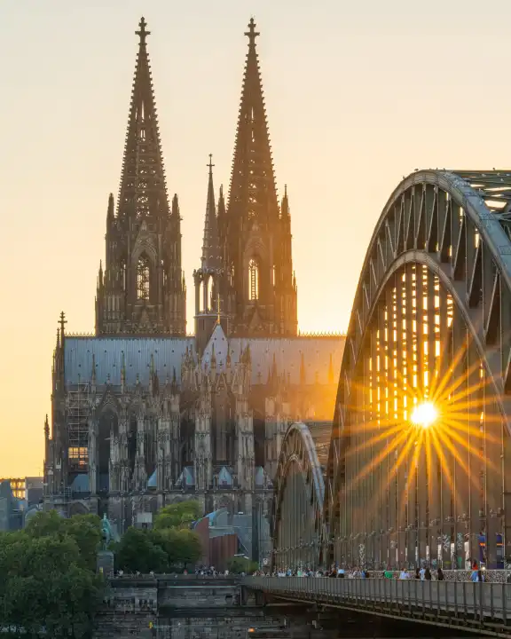 COLOGNE, GERMANY - SEPTEMBER 7, 2023: Cathedral of Cologne against sunset on September 7, 2023 in Germany, Europe