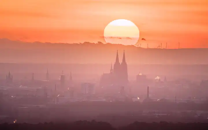 Panoramic image of Cologne with cathedral against sunset, Germany, Europe