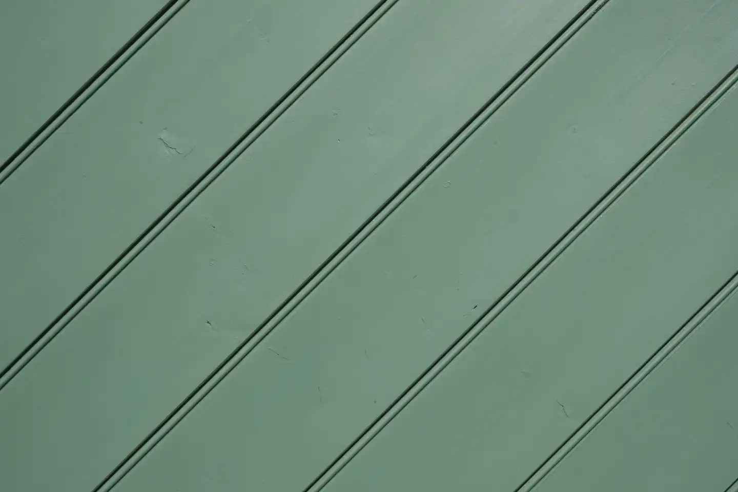 Background, surface with green panels of wood