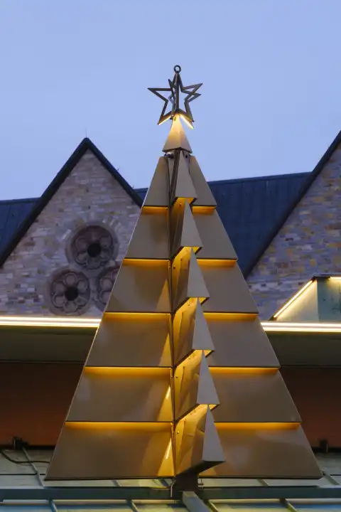 Illuminated artificial Christmas tree in front of the cathedral, Christmas market, Paderborn, Westphalia, North Rhine-Westphalia, Germany, Europe