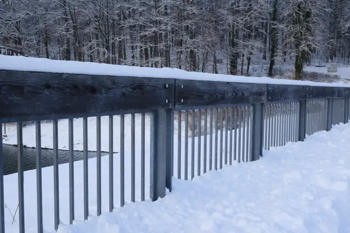 Fence with snow at the Hennesee, Meschede, Sauerland, North Rhine-Westphalia, Germany, Europe