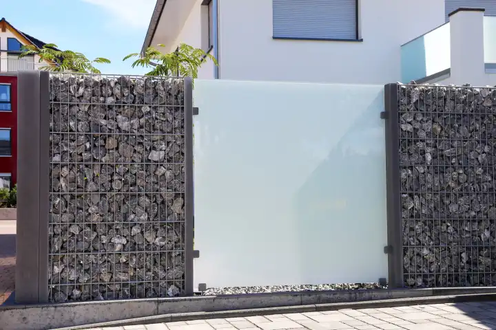 Close up of a gabion fence wall