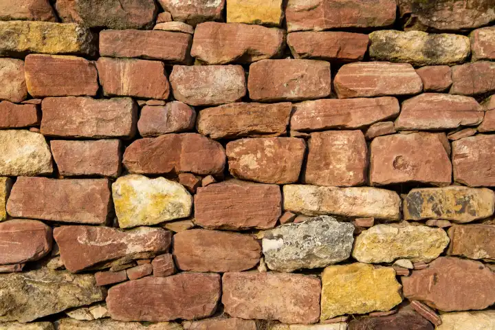 Close up of dry stone wall as background image