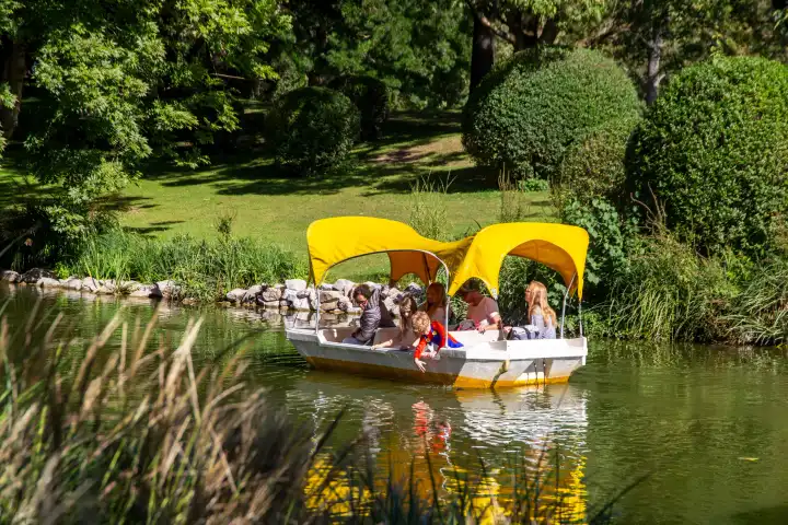 BUGA (Federal Horticultural Show) Mannheim 2023: Gondoletta boats sail through the Kutzerweiher pond in Luisenpark