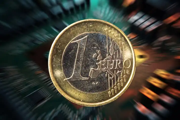 Symbolbild digitaler Euro: Ein-Euro-Münze vor einem virtuellen Hintergrund


