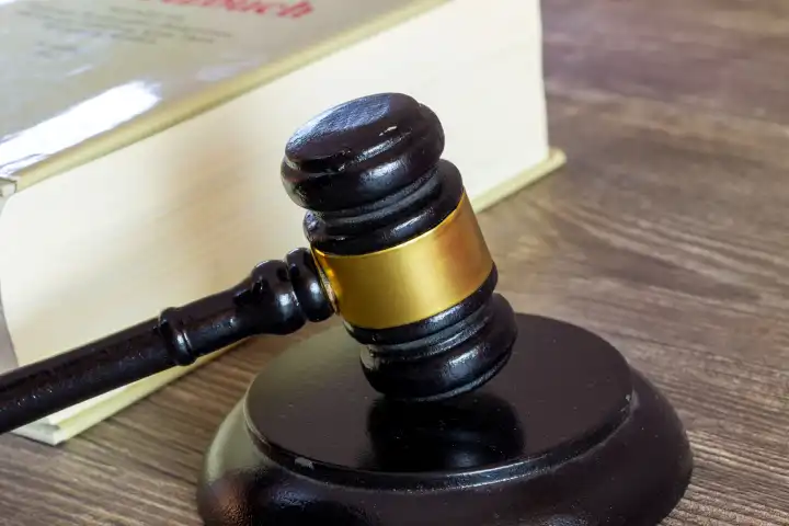 Close-up of a judge's hammer as a symbol for a court ruling