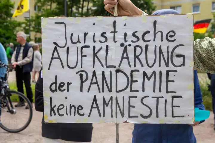 May 19, 2024, Neustadt an der Weinstraße: Rally and demonstration march to Hambach Castle under the motto FROM PEOPLE TO PEOPLE: FREEDOM. Image: A sign demanding a legal reappraisal of the pandemic