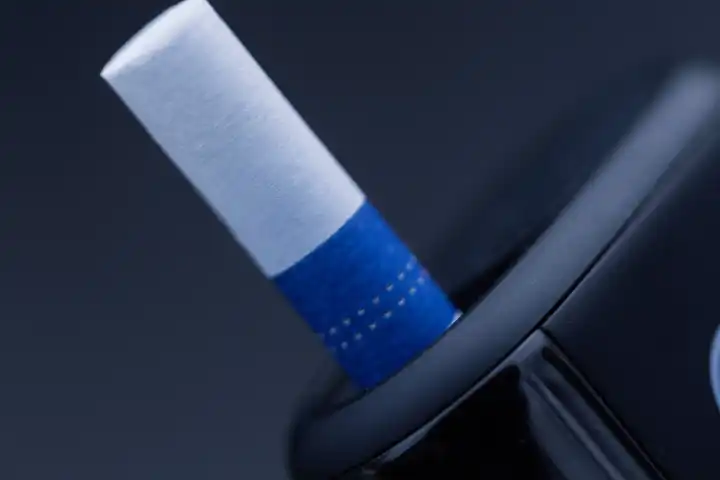 Modern cigarette without burning tobacco, close-up. Heated tobacco product