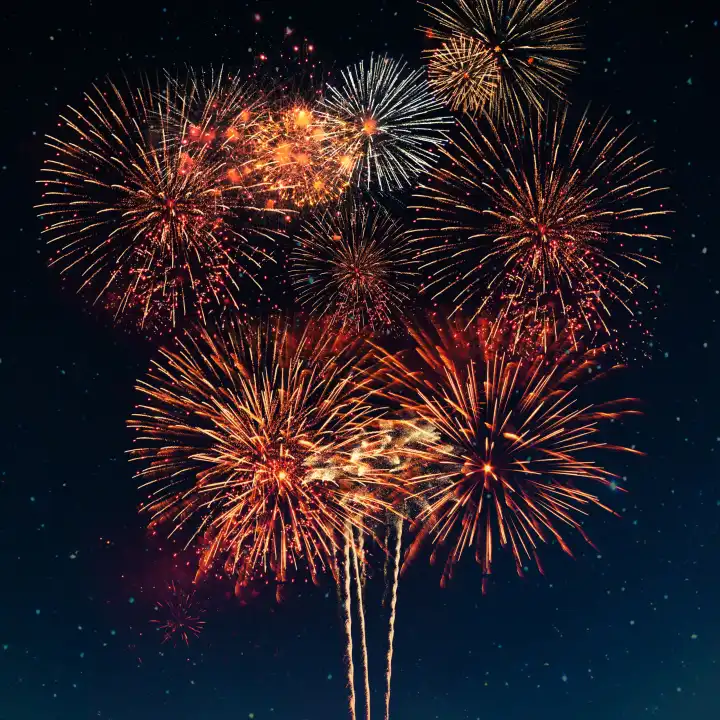 Golden festive fireworks in the starry sky. Celebration