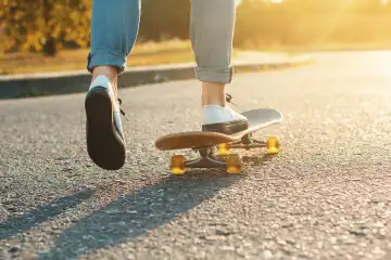 Skateboarding at sunrise.