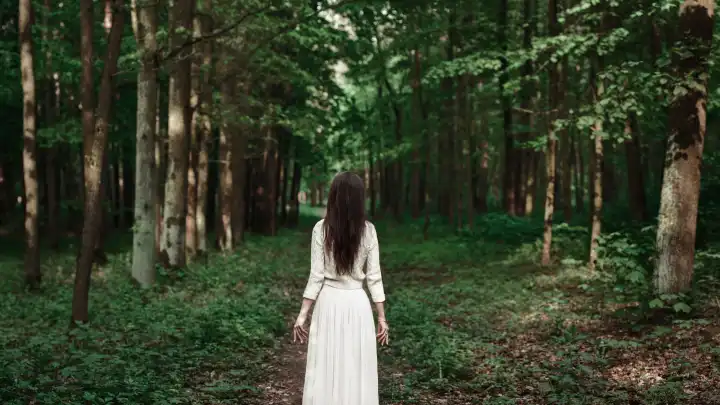 Woman in the magic forest.