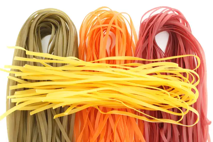 The pasta colored with natural flavors. Colorful noodles for cooking.