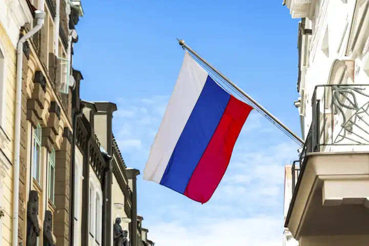 Tallinn, Estonia - 19 July 2023: A Russian flag flies in the wind on a building
