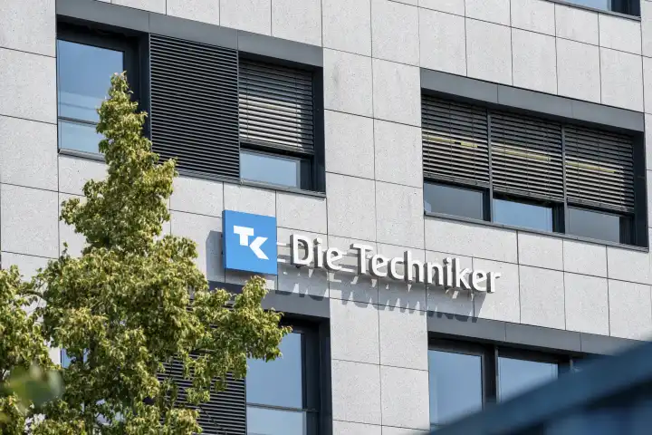 Kiel, Schleswig-Holstein, Germany - 9 July 2023: The logo of the health insurance company Die Techniker on a building. The Techniker health insurance