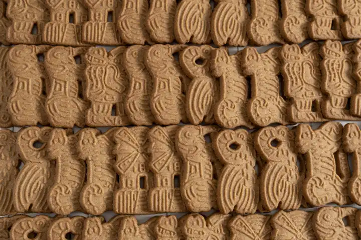 Bavaria, Germany - 29 August 2023: Spiced speculoos background, several speculoos cookies strung together. Christmas and cookies concept