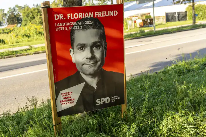 Augsburg, Bavaria, Germany - 2 September 2023: Election poster for the state election in Bavaria. The political party SPD with candidate Dr. Florian Freund. Poster on the roadside in Augsburg, Bavaria