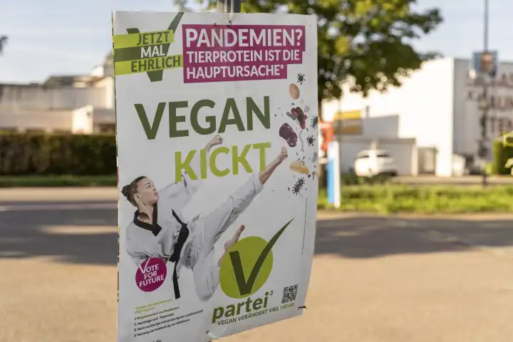 Augsburg, Bavaria, Germany - 2 September 2023: Election poster for the state election in Bavaria. The political party V Party (Vegan). Poster on the roadside in Augsburg, Bavaria