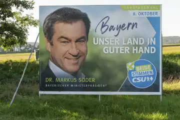 Gablingen, Bavaria, Germany - 7 September 2023: Election poster for the state election in Bavaria from the CSU party with the Prime Minister of the Free State of Bavaria Dr. Markus Söder. Poster on the roadside of Gablingen in Bavaria