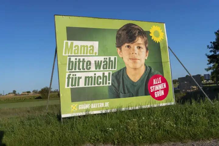 Gablingen, Bavaria, Germany - 7 September 2023: Election poster for the state election in Bavaria from the party Die Grünen. Slogan: Mom, please vote for me! Poster on the roadside of Gablingen in Bavaria