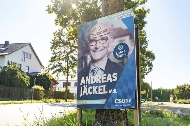 Augsburg, Bavaria, Germany - 7 September 2023: Election poster for the state election in Bavaria from the CSU with candidate Andreas Jäckel smeared with the inscription: AfD understand antidemocrat. Slogan against the Alternative for Germany