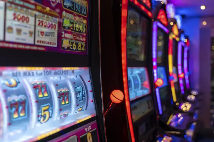 19 September 2023: Glowing slot machines in a casino. Gambling