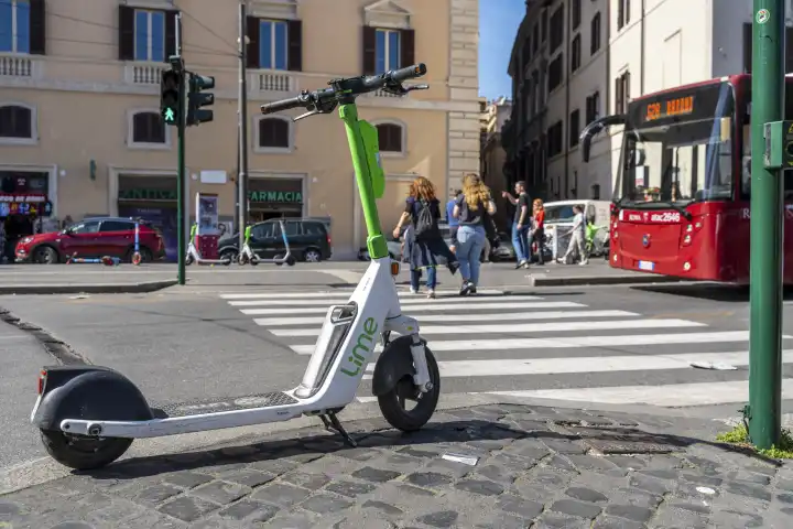 Rome, Italy - 13 March 2023: A Lime e-scooter in the city of Rome in Italy. Rent electric scooter