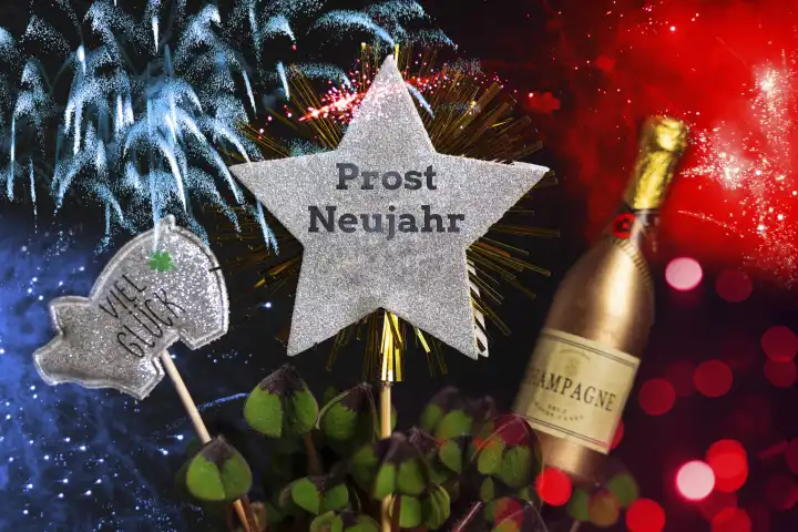 Neujahrswunsch 2024 und Silvester Konzept, Prost Neujahr auf einem Stern inmitten von buntem Feuwerk und Glücksbringern wie Sektflasche und Glücksschwein FOTOMONTAGE