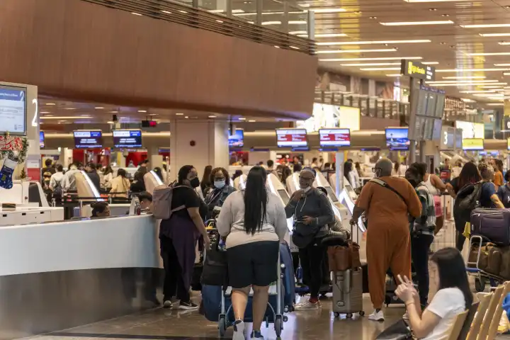 Singapore - January 1, 2024: Theme picture Travel on New Year's Day 2024, numerous people are at Changi International Airport in Singapore