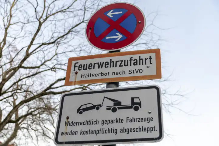 Augsburg, Bavaria, Germany - January 14, 2024: Traffic sign No parking on fire department access road, Illegally parked vehicles will be towed away with costs