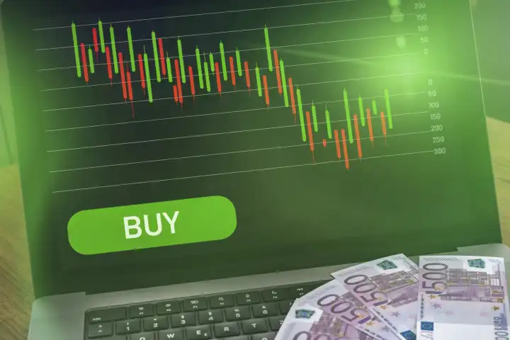 Laptop Computer mit Aktien Chart auf grünem Kaufen Signal. Symbolbild für Handel und Gewinne mit Aktien und ETF FOTOMONTAGE 