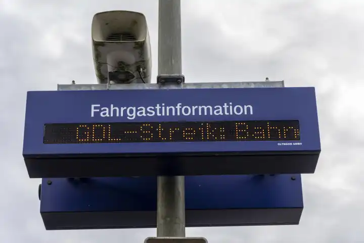 Gablingen, Bavaria, Germany - January 26, 2024: GDL strike symbol, passenger information display with information about the strike at Gablingen station, Bavaria and delays
