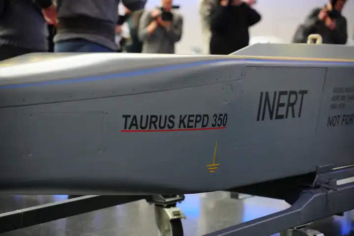 Schrobenhausen, Bavaria, Germany - March 5, 2024: Guided missile Taurus KEPD-350 of the defense industry, a dangerous weapon of war to destroy infrastructure, support electronic warfare, used by the German Armed Forces, at MBDA meeting in Schrobenhausen in Bavaria with Markus Söder
