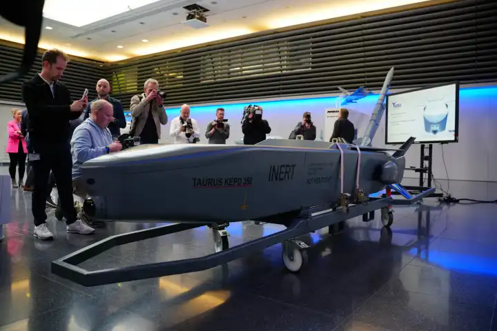 Schrobenhausen, Bavaria, Germany - March 5, 2024: Guided missile Taurus KEPD-350 of the defense industry, a dangerous weapon of war to destroy infrastructure, support electronic warfare, used by the German Armed Forces, at MBDA meeting in Schrobenhausen in Bavaria with Markus Söder