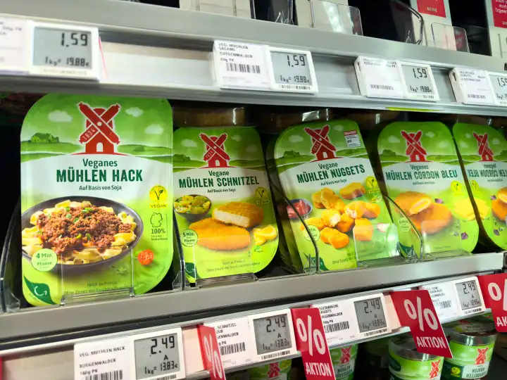Bavaria, Germany - March 27, 2024: Vegan and vegetarian meat substitute products of the Rügenwalder Mühle brand in a refrigerated shelf in a food supermarket ***Vegan and vegetarian meat substitute products of the Rügenwalder Mühle brand in a refrigerated shelf in a food supermarket