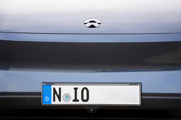 Bavaria, Germany - April 7, 2024: Nio license plate on the bumper of an ET6 from the Chinese e-car manufacturer Nio