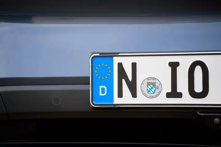 Bavaria, Germany - April 7, 2024: Nio license plate on the bumper of an ET6 from the Chinese e-car manufacturer Nio