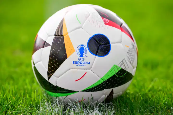 Augsburg, Bavaria, Germany - April 14, 2024: Theme picture: EURO 2024 official soccer match ball from sports supplier Adidas on a soccer field. European Football Championship 2024