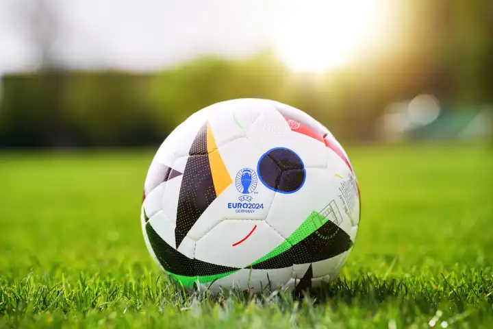 Augsburg, Bavaria, Germany - April 14, 2024: Theme picture: EURO 2024 official soccer match ball from sports supplier Adidas on a soccer field. European Football Championship 2024
